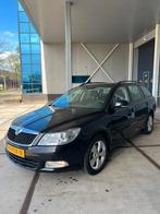 Skoda Octavia 1.2 TSI Combi 2011 Zwart, Auto's, Voorwielaandrijving, Euro 5, Stof, Zwart