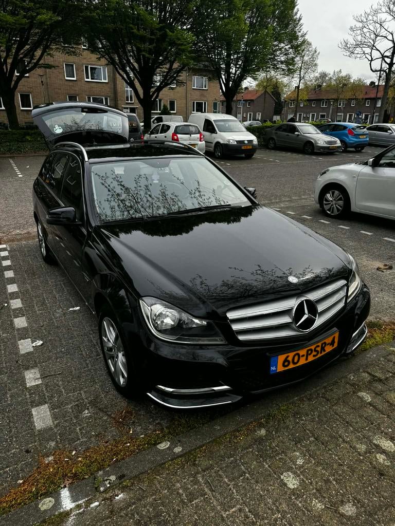 Mercedes-Benz C-Klasse 1.8 C180 CGI Estate AUT 2011 Zwart, Auto's, Mercedes-Benz, Automaat, 1800 kg, 1796 cc, Zwart