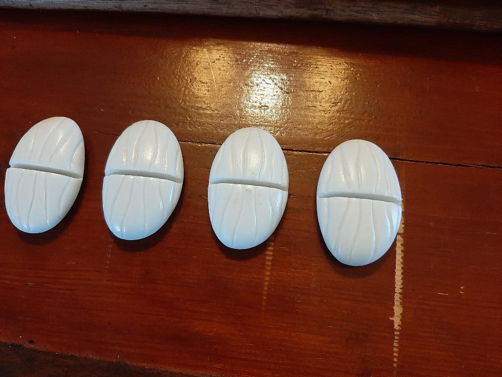 Feeling's 4 witte porseleinen messenleggers, Huis en Inrichting, Keuken | Servies, Overige typen, Ophalen of Verzenden, Zo goed als nieuw