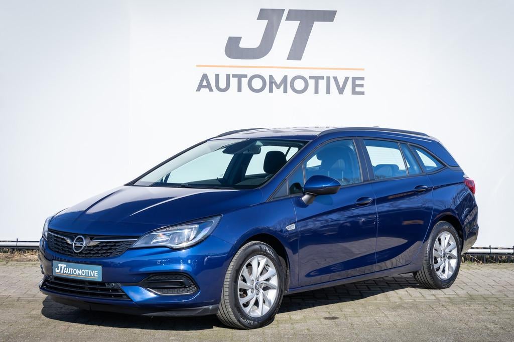Opel Astra SPORTS TOURER 1.2 Edition Parkeersensoren | Trekh, Auto's, Overige Auto's, Euro 6, 1199 cc, Blauw, 23 km/l