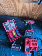 Milwaukee M18 FUEL slagmoersleutel met accu en lader, Ophalen of Verzenden, Gebruikt, Boor- en Schroefmachine, Variabele snelheid