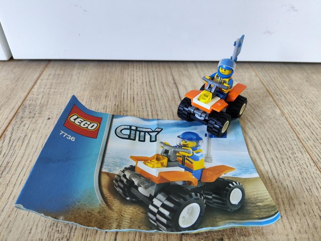 7736 - Lego City Quad met Minifiguur en Instructies, Compleet, Lego, Ophalen of Verzenden, Complete set