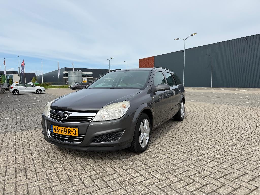 Opel Astra 1.6 16V 85KW St.wgn. 2009 Grijs, Voorwielaandrijving, Origineel Nederlands, Handgeschakeld, Particulier