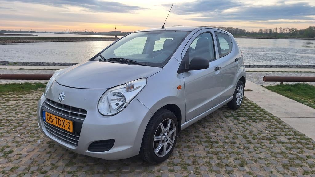 Suzuki Alto 1.0 2012 Grijs, Auto's, Voorwielaandrijving, Stof, 200 kg, 4 stoelen