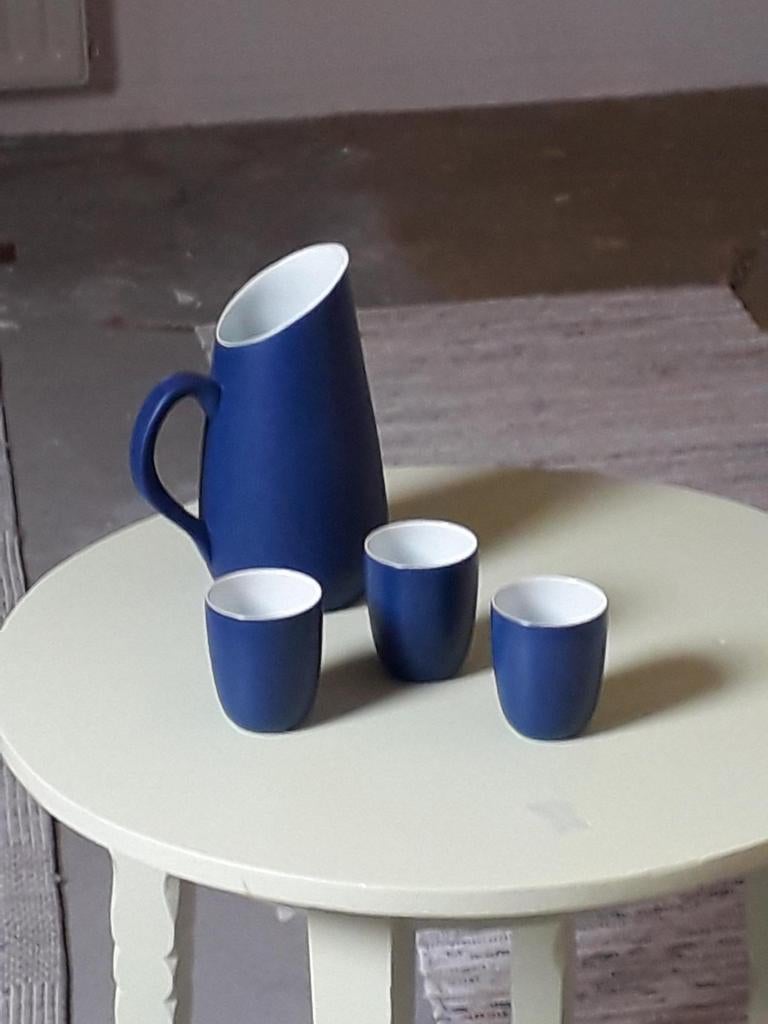 Keramiek melkkan met bekers, Ophalen