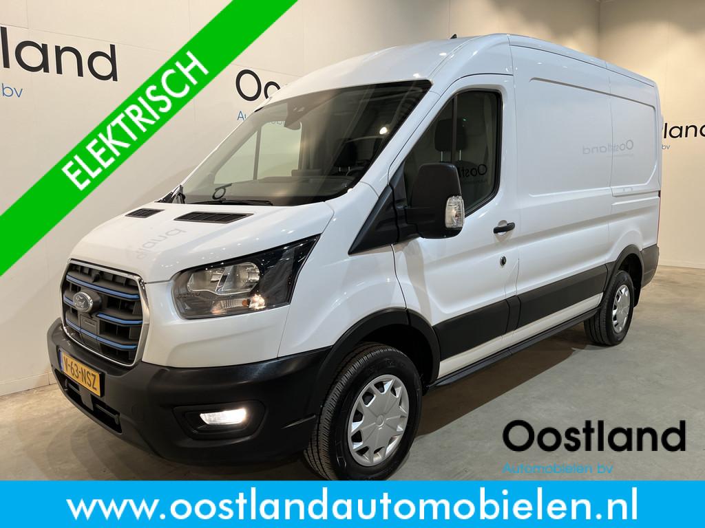 Ford E-Transit 390 (3500 kg) L2H2 Trend 68 kWh / 100% Elektr, Auto's, Bestelauto's, Automaat, Gebruikt, Zwart, Met garantie (alle)