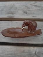 olifant asbakje, Ophalen