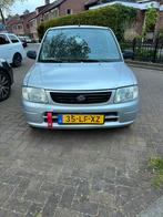 Daihatsu Cuore 1.0 STI 2002 Grijs, Auto's, Origineel Nederlands, Te koop, Zilver of Grijs, 20 km/l