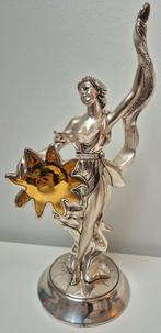 Verzilverd beeld van Marcello Giorgio, Ophalen