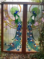 glas in loodramen met pauwen, Ophalen