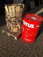 Oudejaarsavond brandton vuurkorf stookton met brandhout, Ophalen