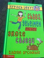 K. MacCombie - Chaos, geheimen en het grote cadeau, Ophalen of Verzenden, Zo goed als nieuw, K. MacCombie