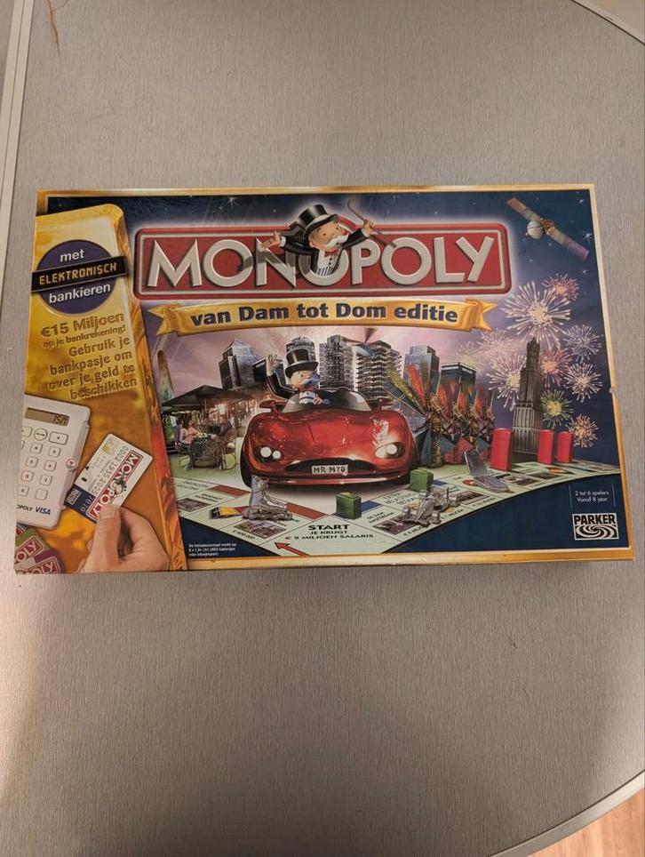 Monopoly van Dam tot Dom editie - Zo goed als nieuw!, Hobby en Vrije tijd, Gezelschapsspellen | Bordspellen, Zo goed als nieuw