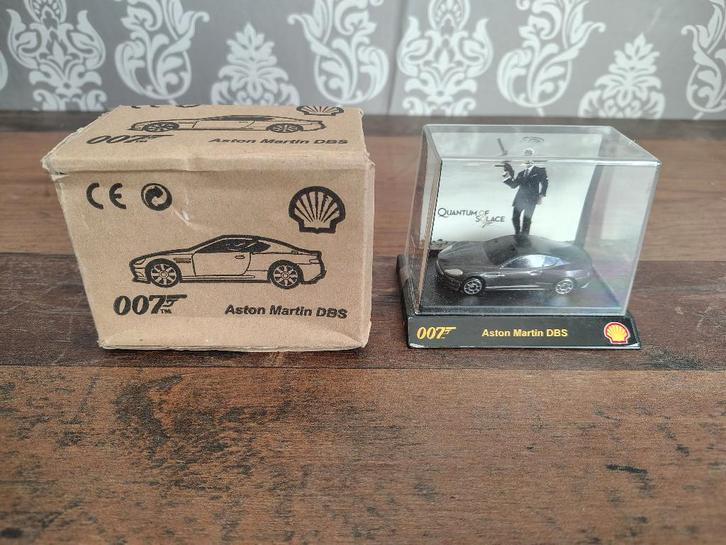 Aston Martin DBS/ James Bond 007/ Shell uitgave/ Nieuw !!, Hobby en Vrije tijd, Modelauto's | Overige schalen, Nieuw, Auto, Verzenden