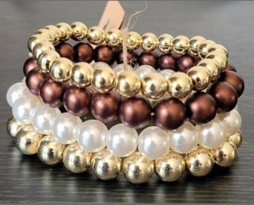 Mooie armbanden, kettingen, oorbellen tassen en meer beschikbaar voor biedingen