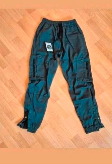 Nieuwe grijze cargo broek maat 128-134. Band 28 cm enkel beschikbaar voor biedingen