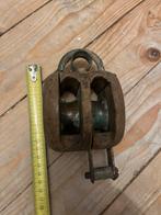 Oude houten katrol, Ophalen