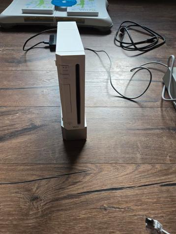 Nintendo wii met controllers en wii fit + balance board beschikbaar voor biedingen