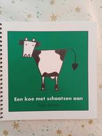 Een koe met schaatsen aan.   DELIA BREMER  Hagelnieuw@, Ophalen of Verzenden, Zo goed als nieuw