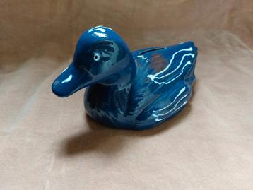Terracotta eendje spaarpot blauw beschikbaar voor biedingen