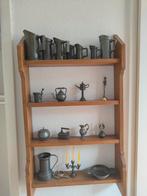 Houten rek met tin objecten, Ophalen