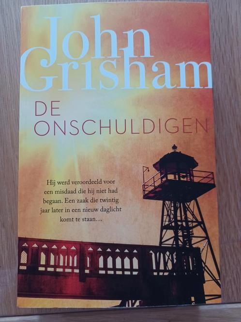 John Grisham - De onschuldigen, Boeken, Thrillers, Zo goed als nieuw, Nederland, Ophalen