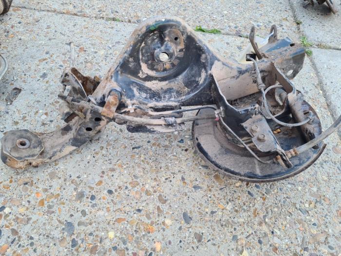 Fusee links-achter van een Nissan Qashqai, Auto-onderdelen, Ophanging en Onderstel, Nissan, Gebruikt, 3 maanden garantie