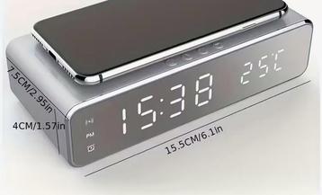 NIEUW * Wekker klok met draadloos opladen telefoon beschikbaar voor biedingen