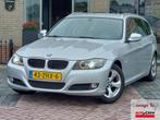 BMW 3-serie Touring 318i Luxury Line | Leder | Xenon | Navi, Auto's, Automaat, Euro 5, 1435 kg, 3-Serie