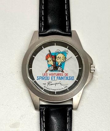 Horloge en pin van Robbedoes beschikbaar voor biedingen