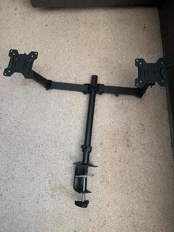 Stevige dubbele monitorarm voor twee schermen. beschikbaar voor biedingen