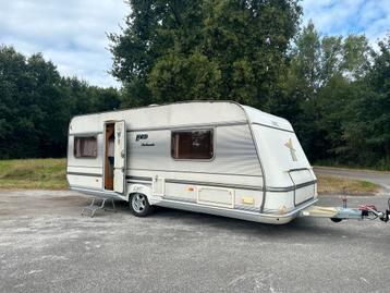 LMC Ambassador 560 met voortent, enkele bedden dakairco beschikbaar voor biedingen