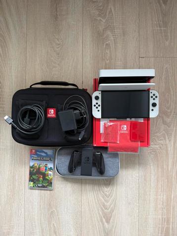 Nintendo switch oled Met accessoires In orginele verpakking! beschikbaar voor biedingen