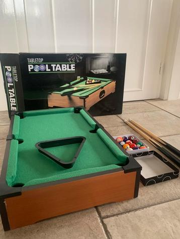 Mini Pooltafel beschikbaar voor biedingen