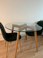 Ronde glazen eettafel met houten onderstel, Huis en Inrichting, Gebruikt, 100 tot 150 cm, Rond, Glas