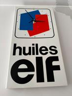 ELF huiles / olie wandklok, Verzenden, Zo goed als nieuw, Gebruiksvoorwerp