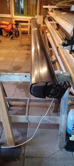 BRUIN GEMOFFELD CASS.SCHERM 5,5x3 mtr. Somfy ZGAN !!, Ophalen, 450 cm of meer, Zo goed als nieuw, Knikarmscherm