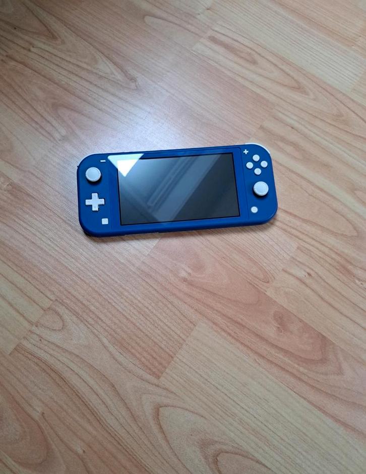 Nintendo switch lite blauw, Spelcomputers en Games, Spelcomputers | Nintendo Switch Lite, Zo goed als nieuw, Ophalen of Verzenden
