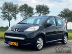 Peugeot 107 1.0-12V XS 5-deurs Airco, Voorwielaandrijving, Stof, Gebruikt, Zwart