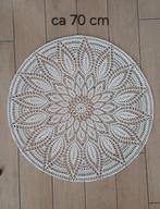 Gehaakte mandala, Ophalen