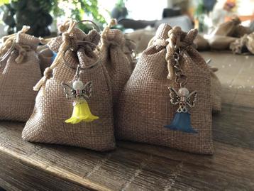 Geurparels in zakjes met engel hanger beschikbaar voor biedingen