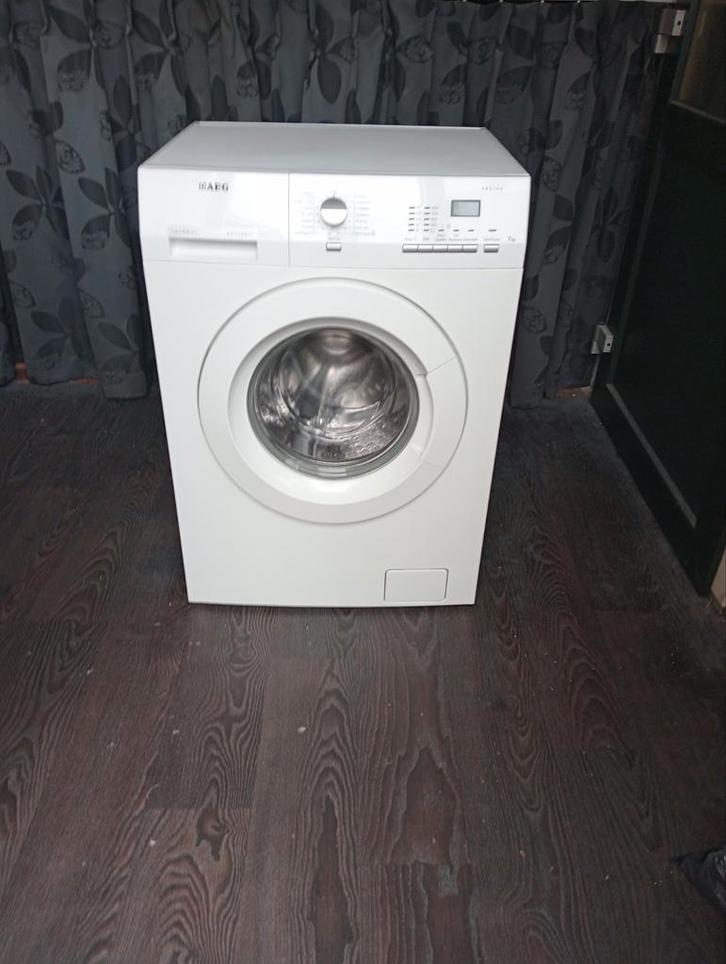 Goedwerkende wasmachine merk aeg 1400 toeren 7kg, Witgoed en Apparatuur, Wasmachines, Zo goed als nieuw, 6 tot 8 kg, Minder dan 85 cm
