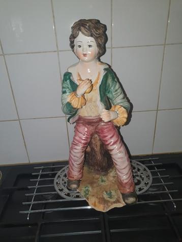 Jongen van porselein  60 cm. beschikbaar voor biedingen