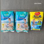 Pampers en Huggies - 26 zwemluiers 9-15kg, Kinderen en Baby's, Babykleding | Baby-zwemkleding, Pampers, Jongetje of Meisje, Nieuw