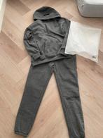 trainingspak essentials, Ophalen of Verzenden, Zo goed als nieuw, Maat 38/40 (M), Zwart