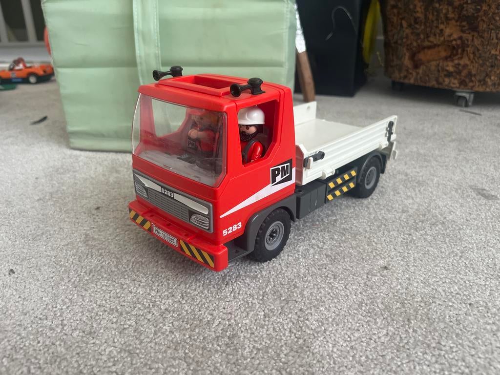 Playmobil vrachtwagen met 2 poppetjes en accessoires, Ophalen of Verzenden, Gebruikt, Complete set