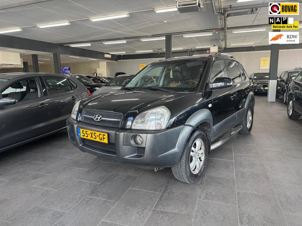 Hyundai Tucson 2.0i Style Premium LPG g3 leer clima cruise c, Auto's, 4 cilinders, Startonderbreker, Zwart, Handgeschakeld