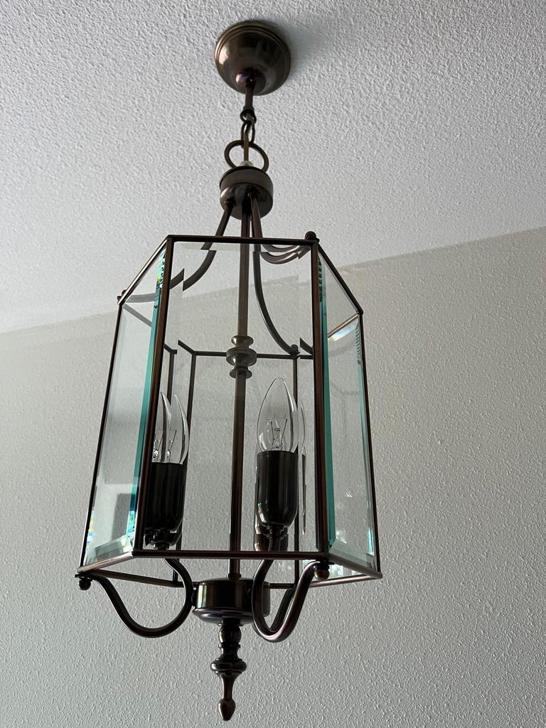 Antieke hanglamp met glazen panelen, Ophalen