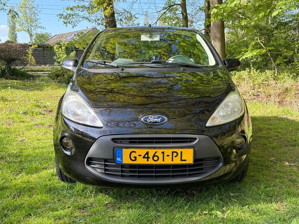 Ford Ka 1.2 51KW 2009 Zwart, Auto's, Voorwielaandrijving, Stof, 4 cilinders, 4 stoelen