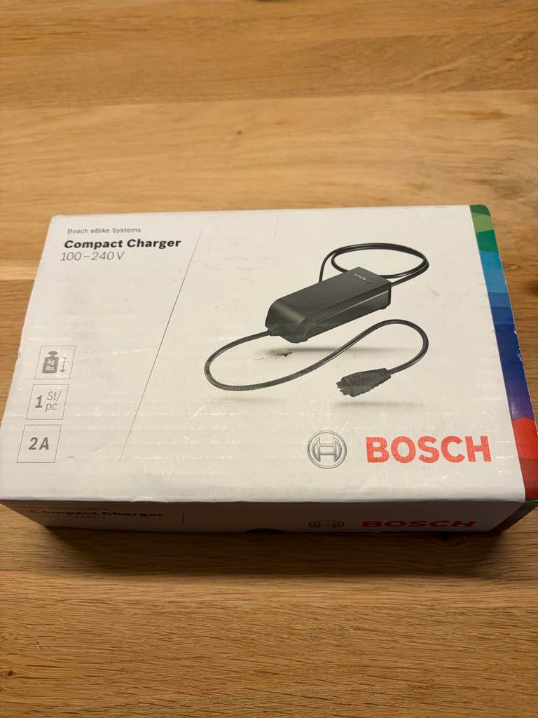 Bosch eBike Compact Charger 2A, Fietsen en Brommers, Fietsaccessoires | Fietsaccu's, Ophalen of Verzenden, Zo goed als nieuw